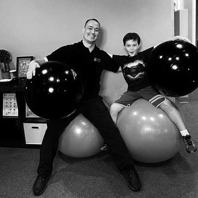 Chiropractor Orange City FL Doctor Terry Watts and Child Exercise Balls